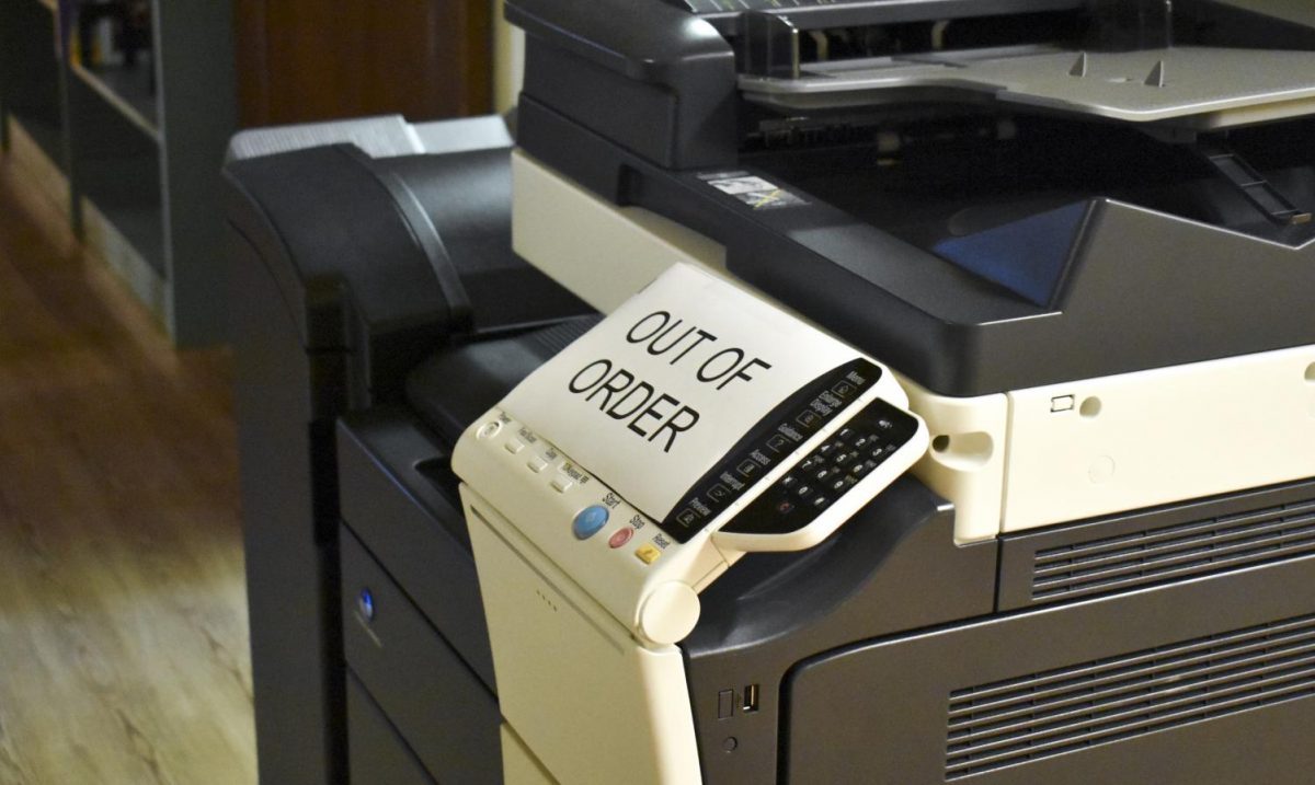 The printer sits idle until a solution can be found to save paper and ink.