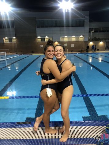 Seniors Callie Malone (left) and Alex Loos (right) during their waterpolo season in early September.