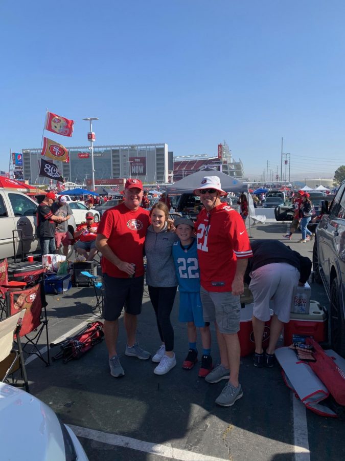 Junior Maddie Perry poses with family and friends at one of last seasons 49ers games.