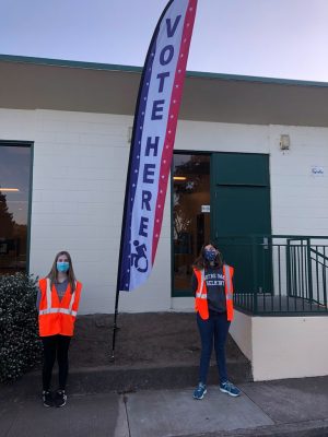 NDB juniors Angelina Chopoff and Payton Peters volunteered at the polls in Daly City on Election Day.