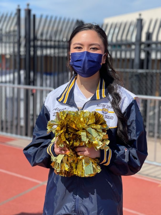 Senior Alyssa Enriquez ready to cheer at her last game on April 3rd at Serra HS.