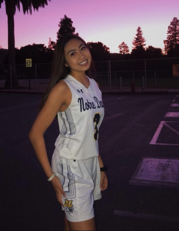 Adao+in+her+basketball+uniform.