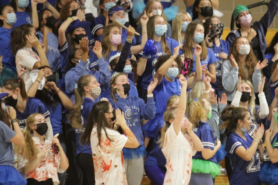 The Spartans cheer their hearts out in during their last Ding-Bat Day rally.