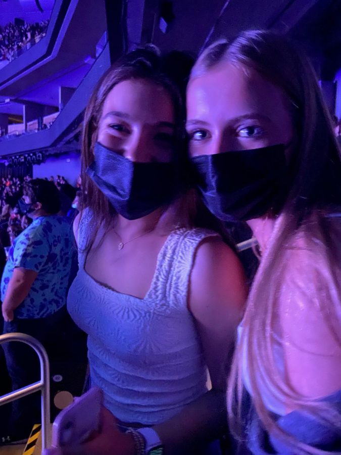 Juniors Kassie Hickson and Anna Keim stay COVID-19 safe at the Tame Impala concert.