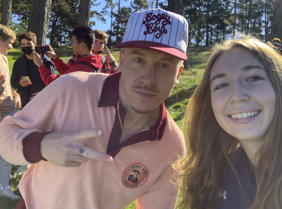 Sophomore Annette Henderson scores a selfie with Macklemore at Spyglass Hills Golf Course during the AT&T Golf Tournament.