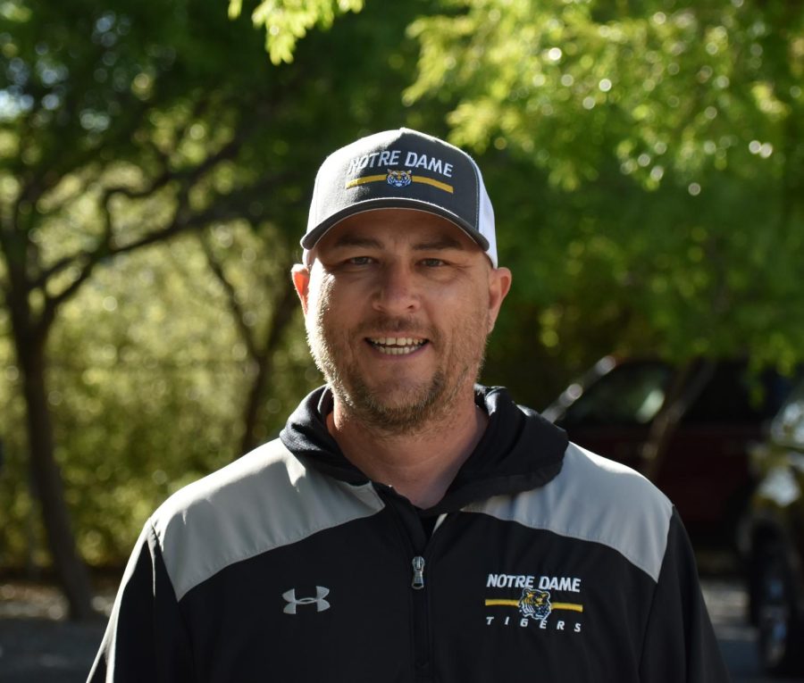 Jason Levine smiles after his last senior softball game as athletic director.