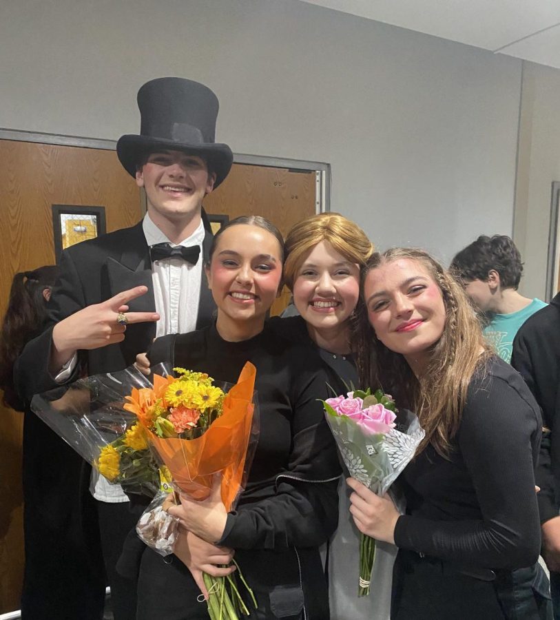 Tri-School actors Thomas Lussier, Sara Muzzi, Jasmine Westphal-Cullen and Sianna Kiebler celebrate after finishing their last performance of Ghostlight.