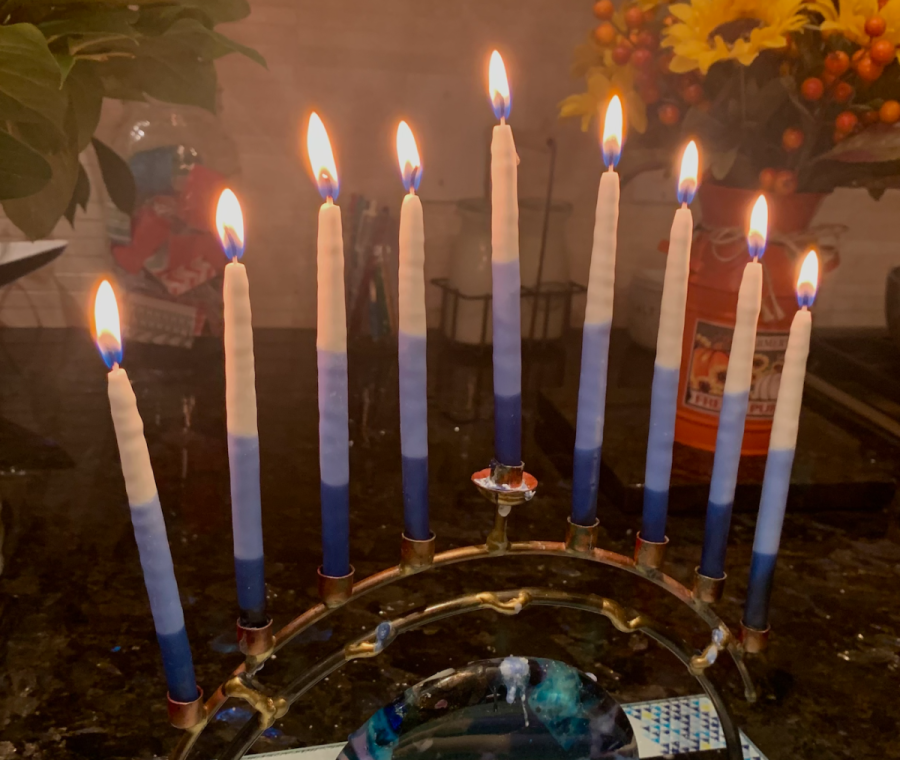 Lighting the menorah is a ritual to celebrate the eight nights of Hanukkah.