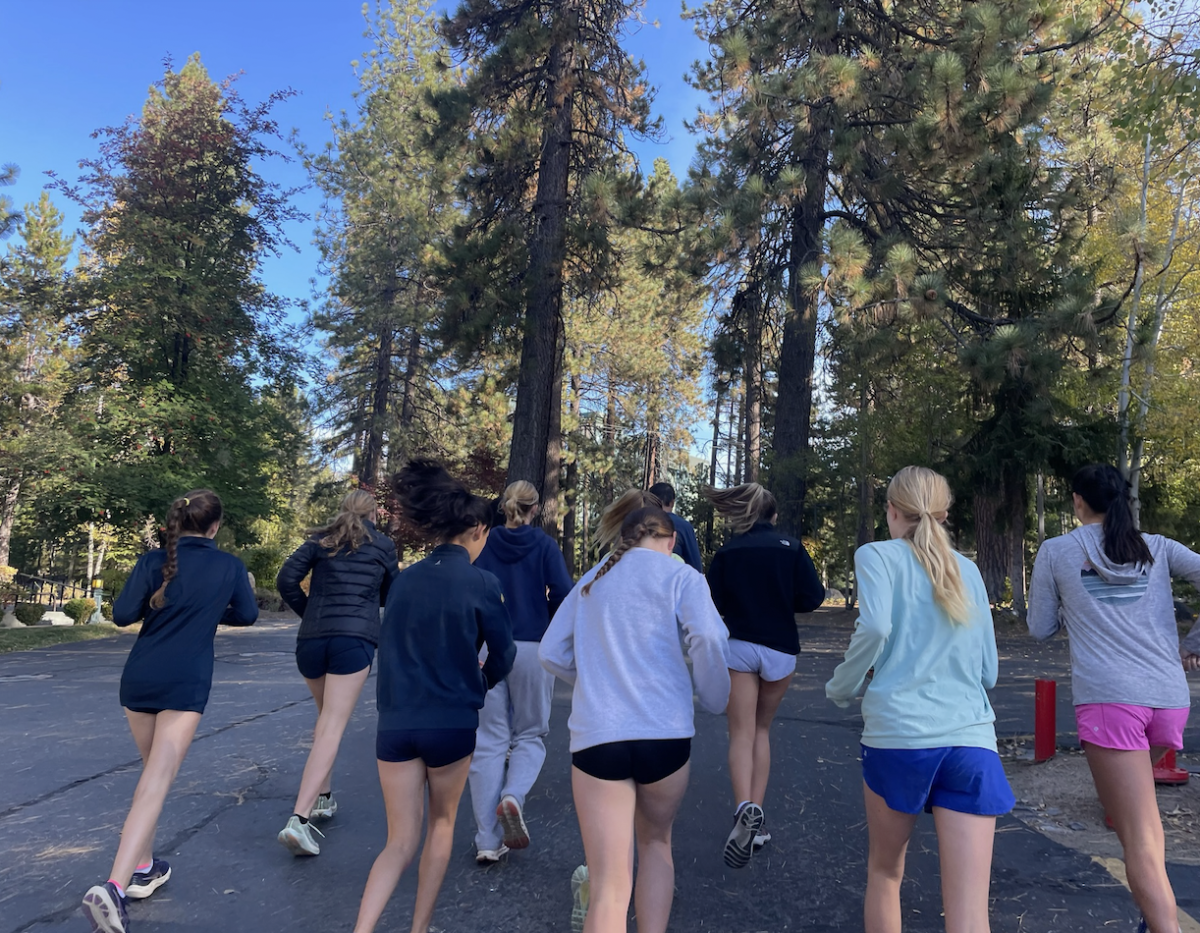 Cross country runners begin a morning run in Lake Tahoe.