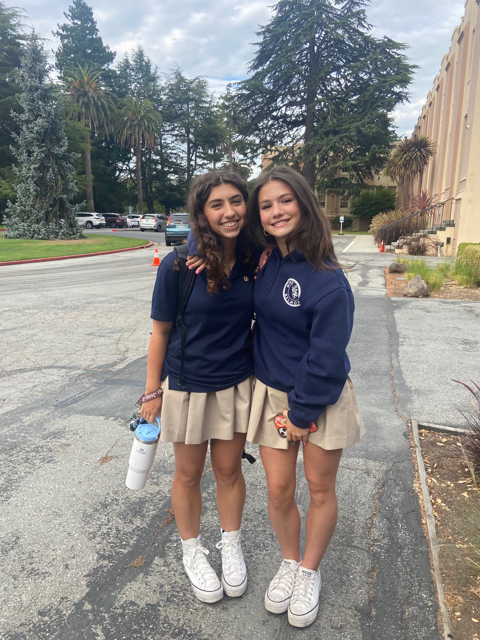 Sisters Sabrina and Olivia Philip arrive at school together.
