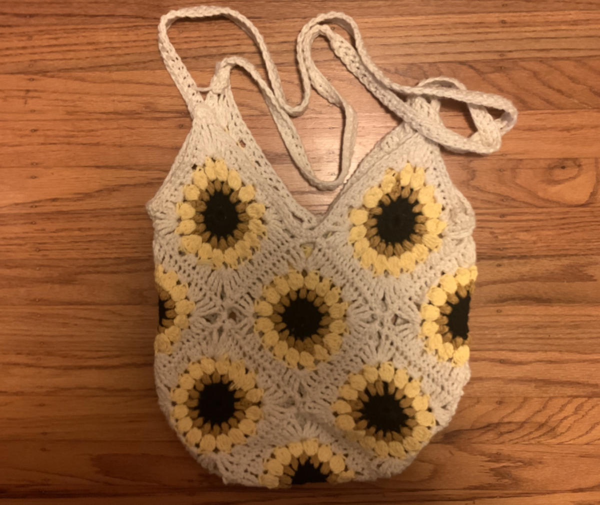Tote bags can be made by crocheting sunflower granny squares together.