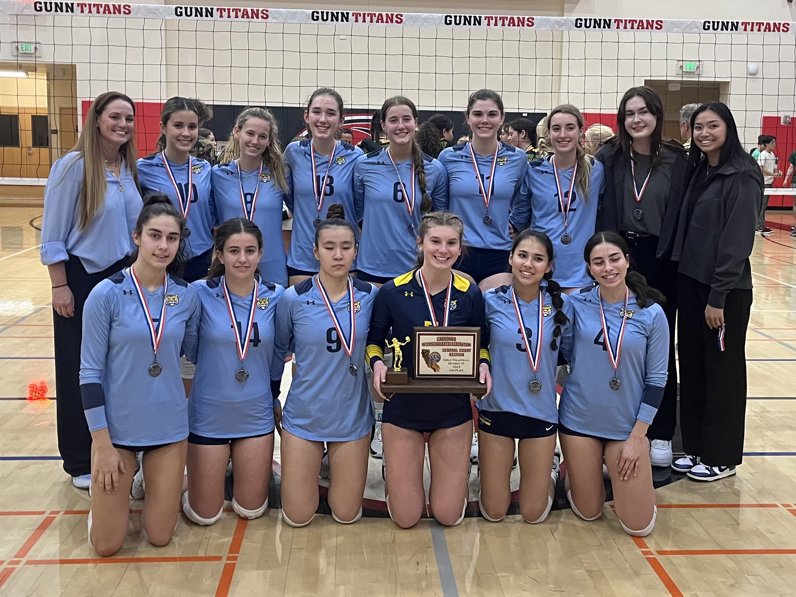 The NDB Varsity Volleyball team poses after winning 2nd place in the CCS Championship.