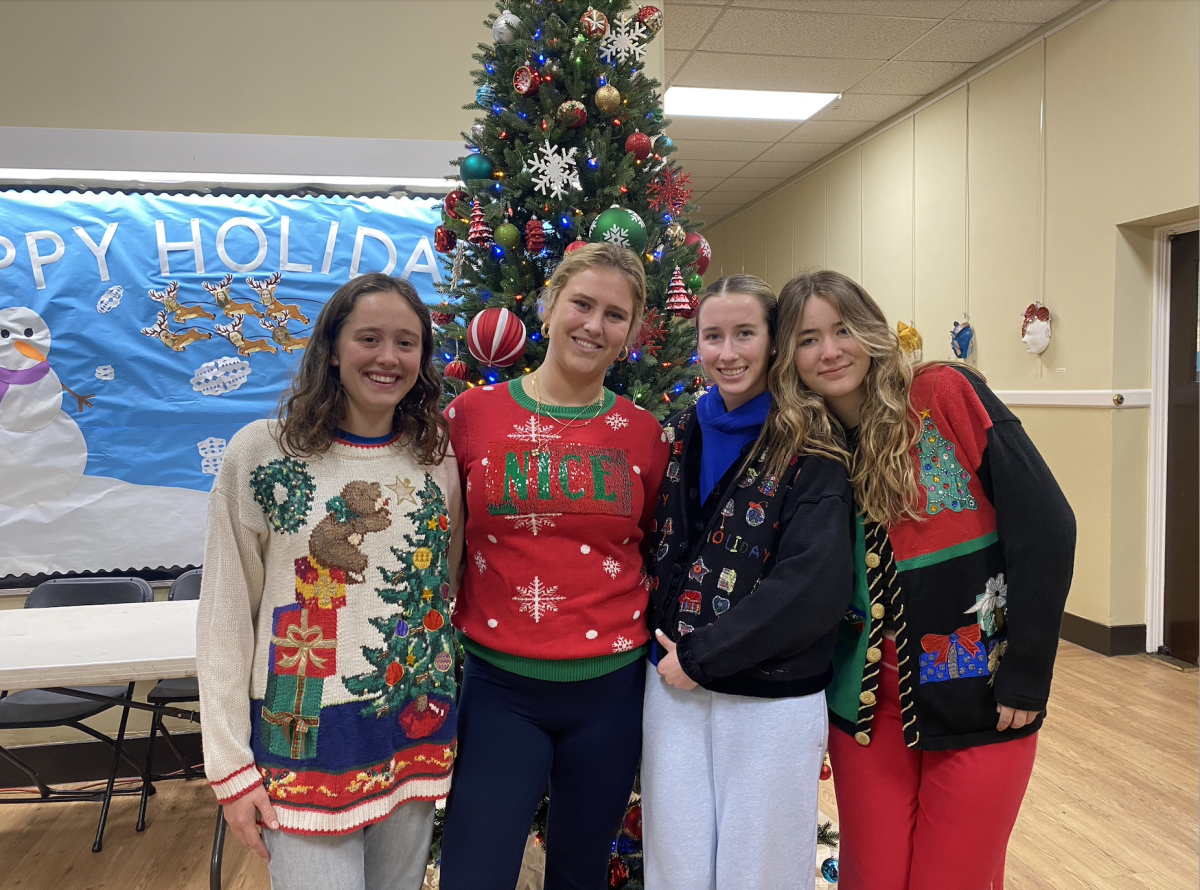 Members of ASB show off their ugly Christmas sweaters.