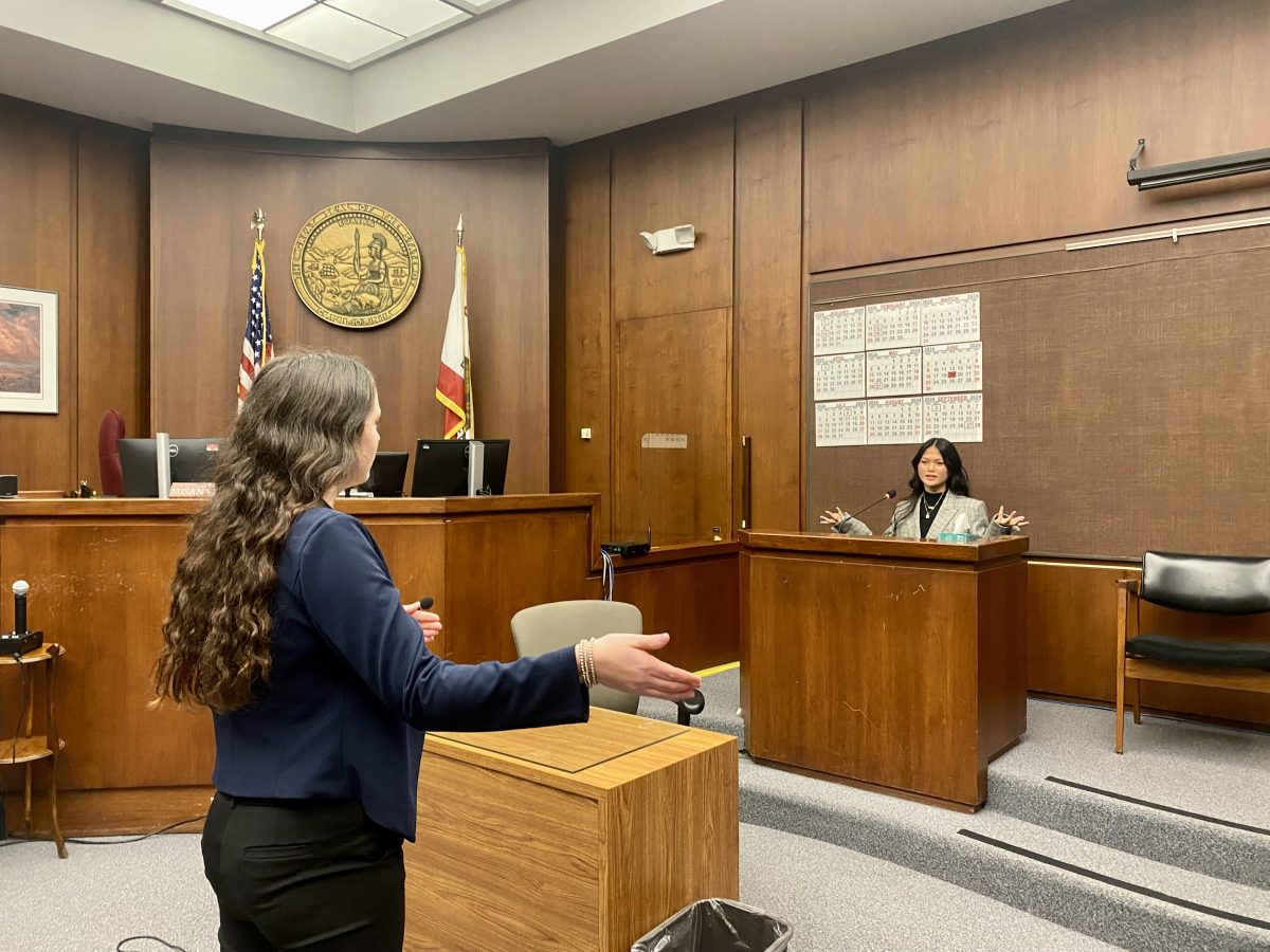 During their trial on February 8, attorney Page Krensavage questions the
defendant, Tobie Clark, played by junior Alexis Hom.