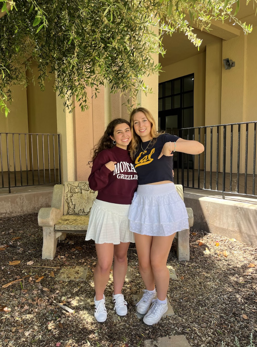 Sabrina (left) and Annette (right) pose in their college apparel. 