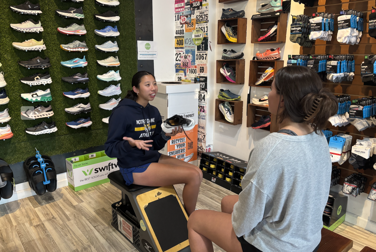 Andie Wong enjoys interacting with guests at A
Runner’s Mind, a local running store in Burlingame.