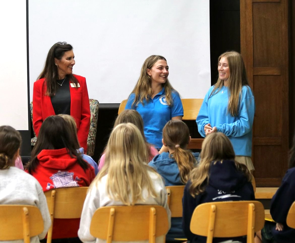 Ambassador Board Members meet prospective students before their shadow visit.