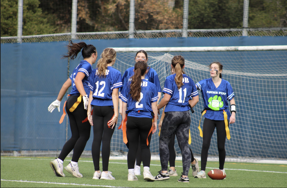 Blue and green team (Freshman and Juniors) celebrating one of their many touchdowns.