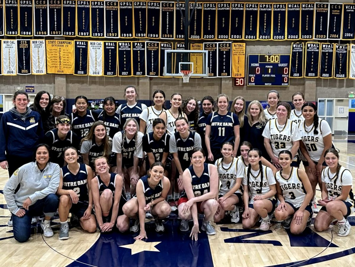 Varsity and Alumni Teams Pose After Last Year's Match