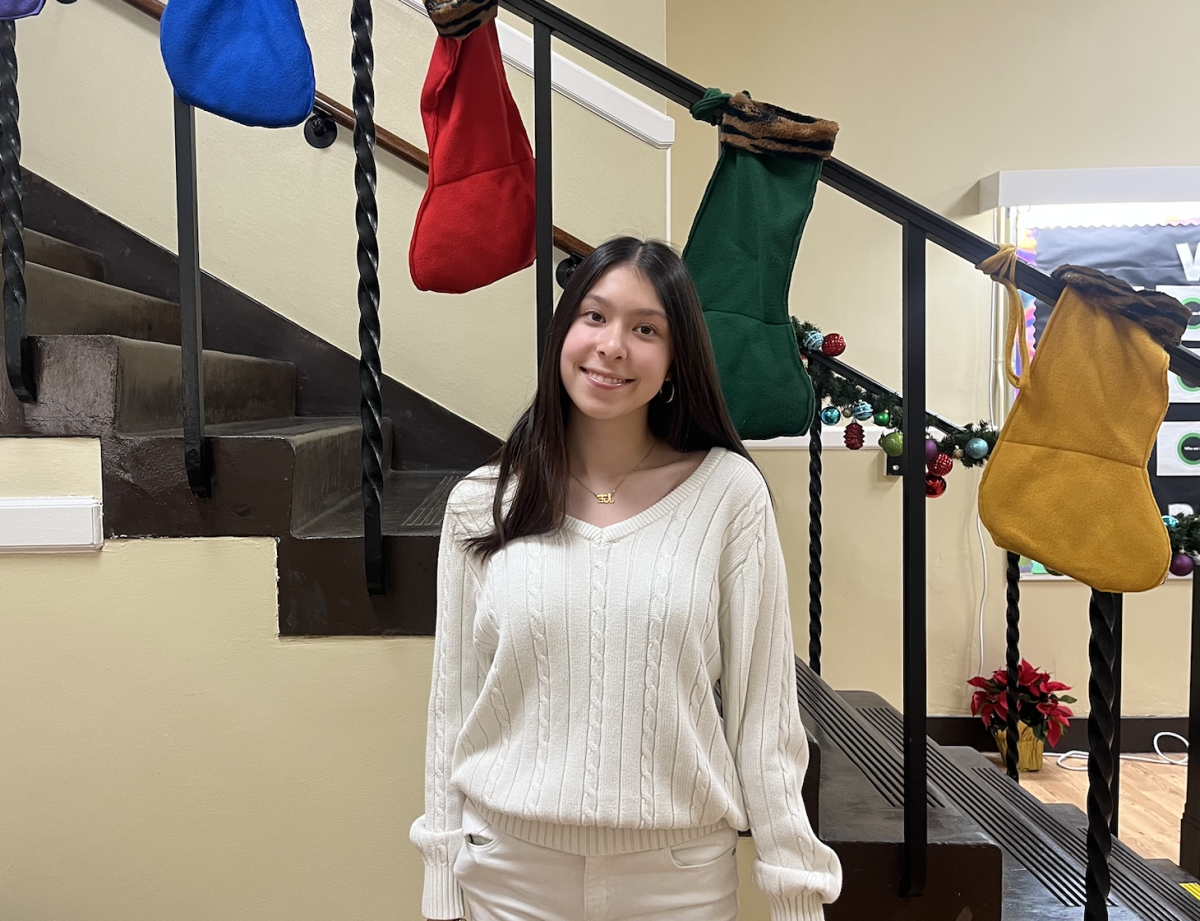 Sophomore Allison Wright dresses in all white for "Snowy Day" on Dec. 9.