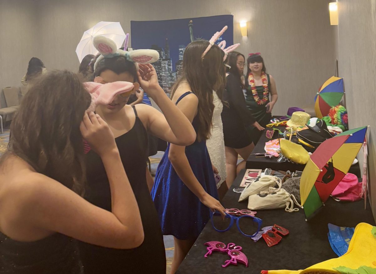 Students dance in a “Night in New York” at Winter Formal