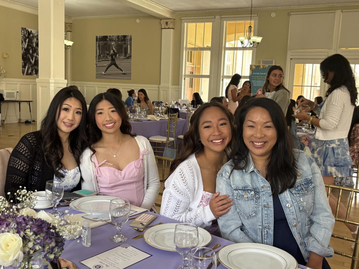 Renee Chin and Tila Chin ‘25 pose with Tiffany Tisen and Allison Lui ‘25.