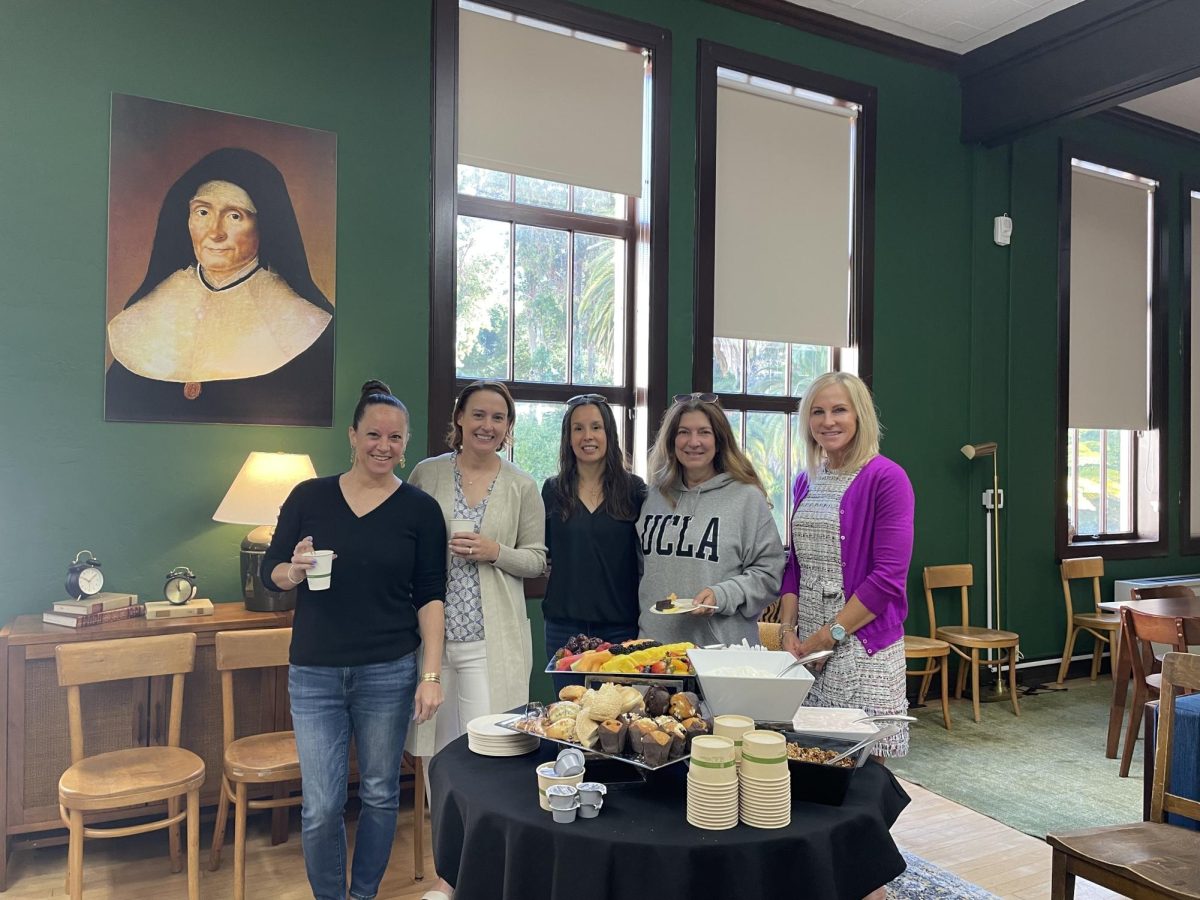 The moms of four seniors joined Dean of Academic Advisement Kristi Rossi in celebrating their children’s milestone of choosing where to attend college.