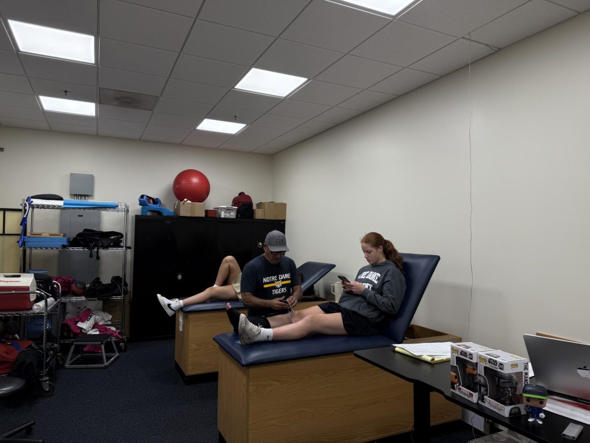 Student athletes undergoing treatment on their ACL injuries by NDB athletic director, Laz.
