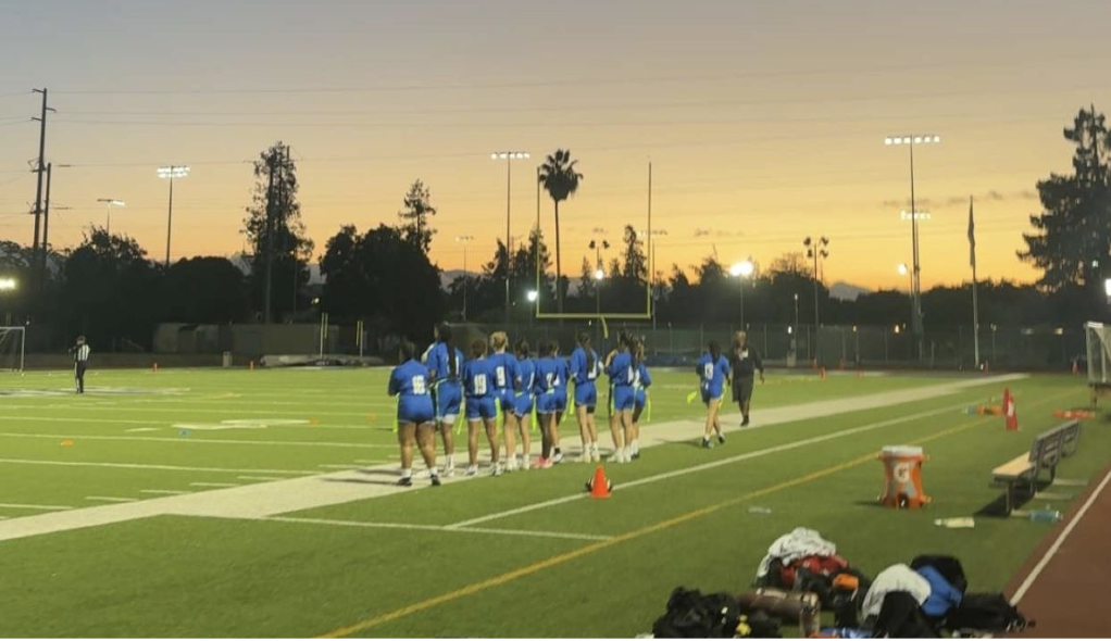 NDB's flag football team on the sidelines. 
