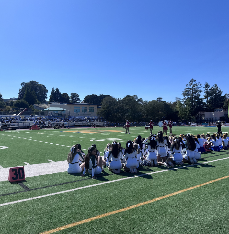 NDB cheer team on the sidelines of the Serra football game against De La Salle.