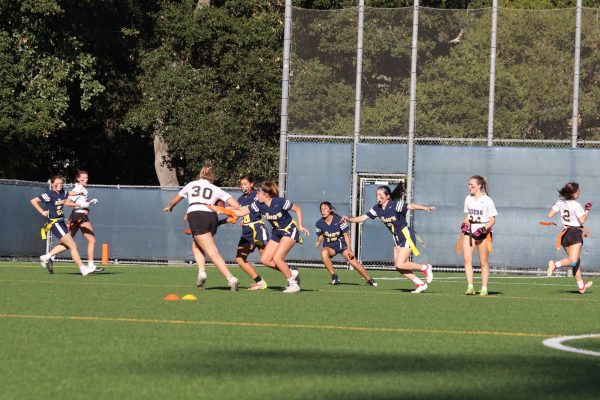 Flag football team players try to get by The King’s Academy defense during a recent game at NDNU’s Koret Field.