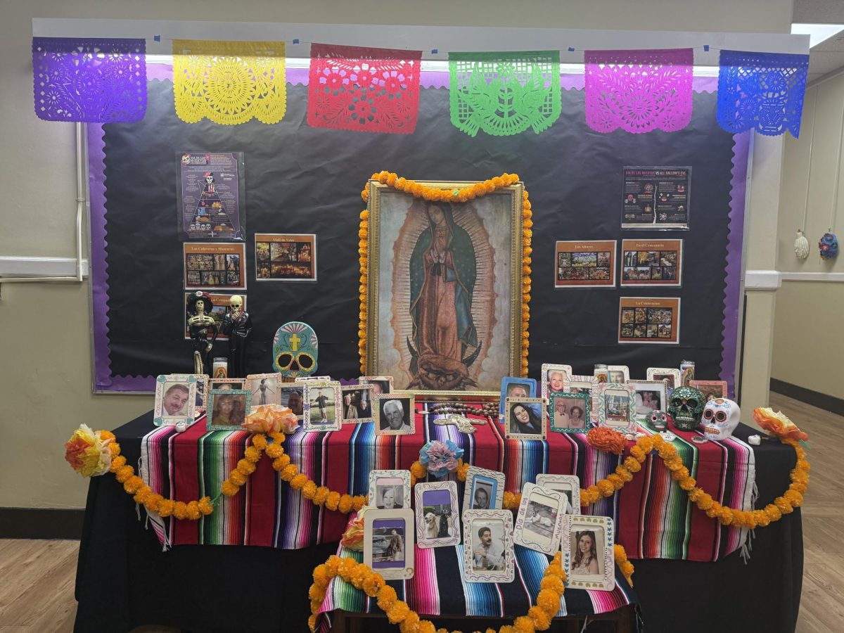 An ofrenda or altar for Día de los Muertos honors deceased loved ones.