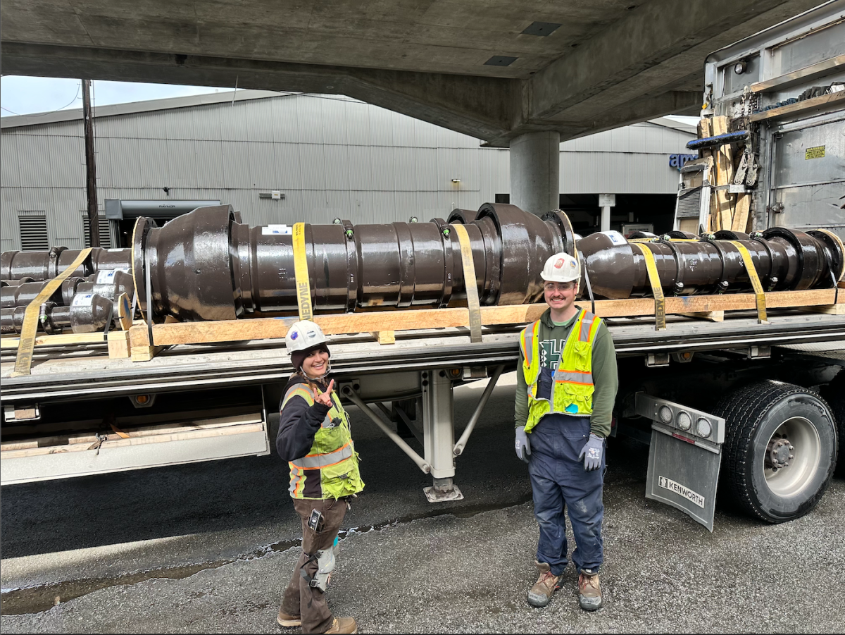 Plumber Kelsey Lester and her colleague report to a jobsite.