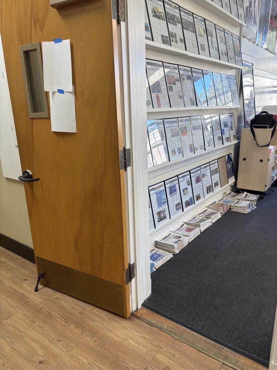 An open classroom door during a lockdown drill—preparation for a reality no student should have to face.