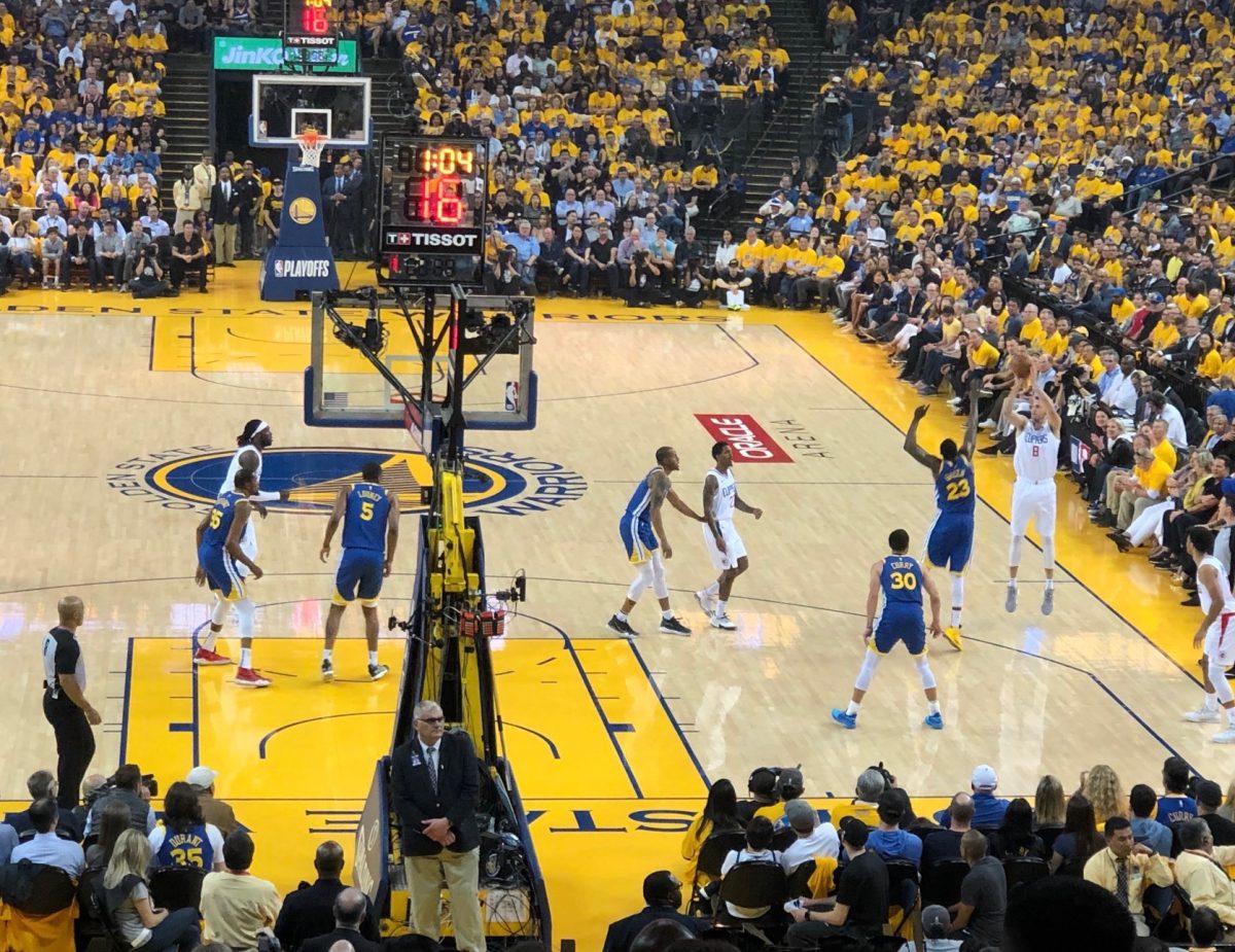 The Golden State Warriors professional basketball team playing a game. 