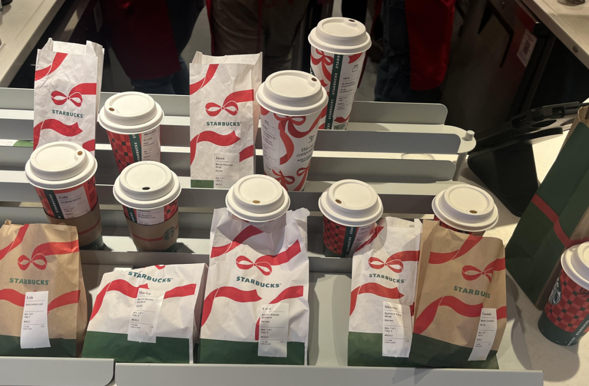 Starbucks adds special holiday-print bags and cups to its seasonal menu drinks, bringing even more festive cheer to customers.
