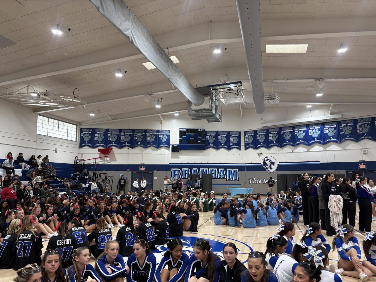 Competition teams gather together and wait for awards to be announced.