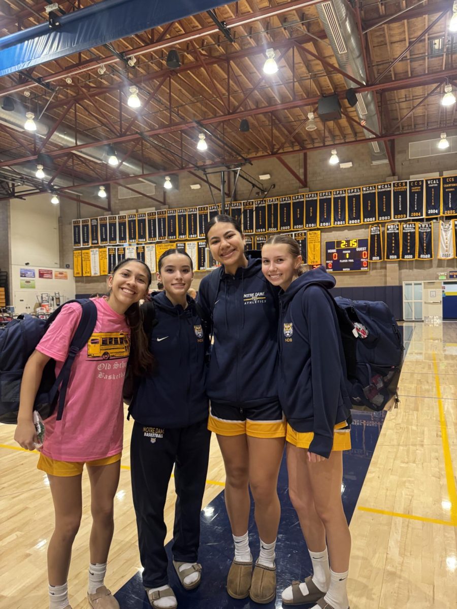 NDB basketball team taking a photo before a game.