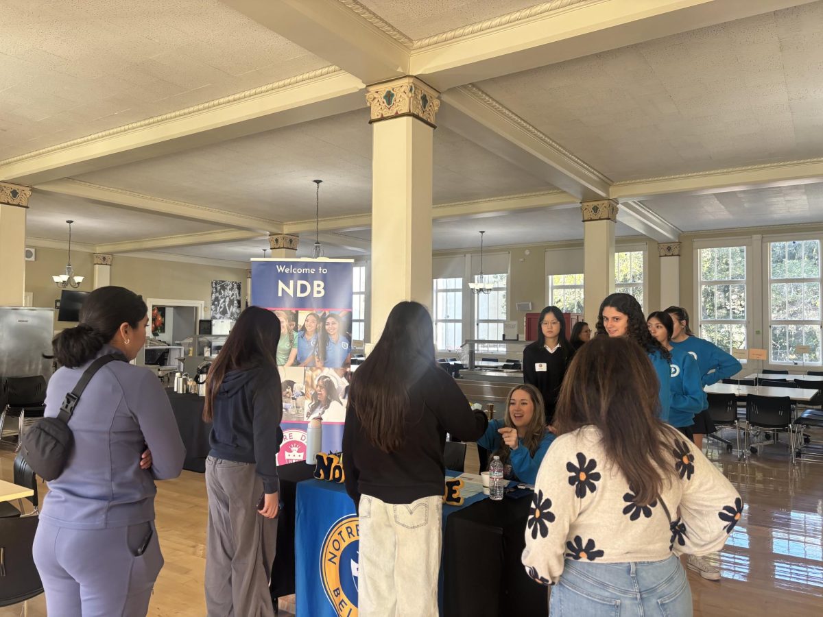 Board members greet families during admissions interviews.