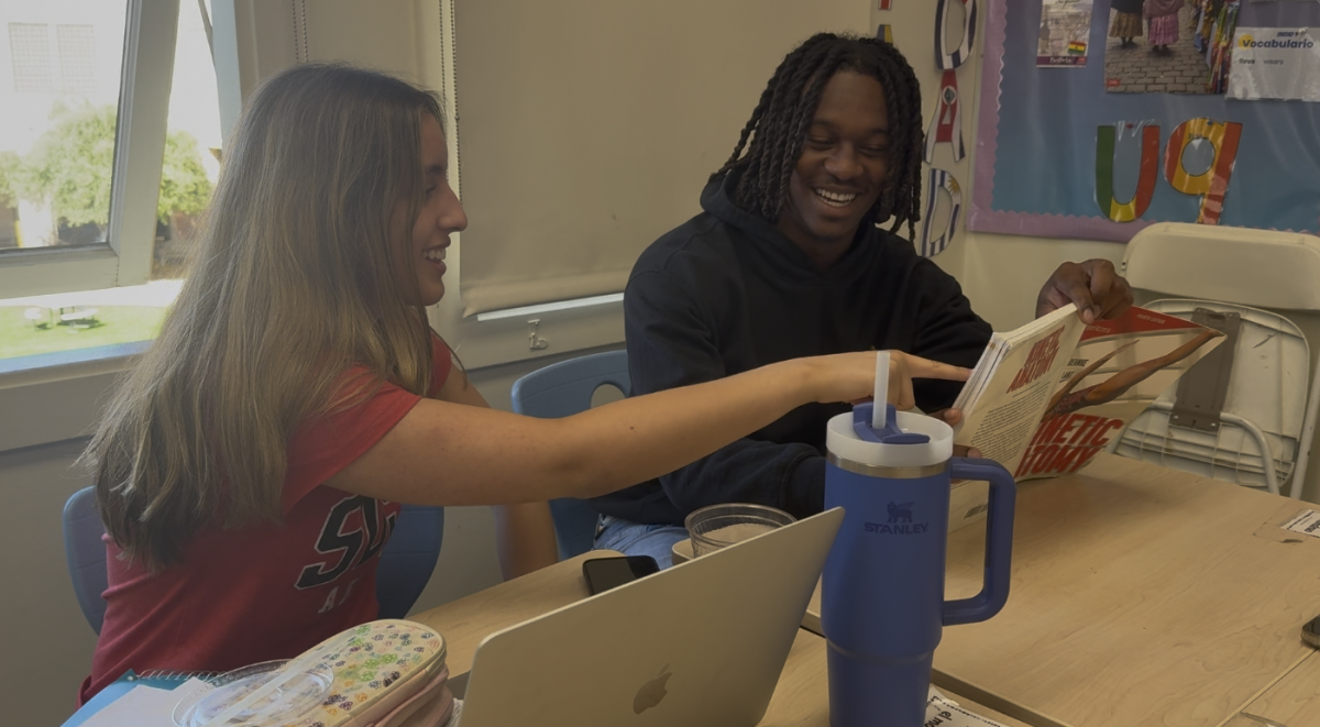 NDB Senior, Sophia Nielsen and Aaron Maier who attends Serra High School also a senior, collaborating in their Tri-School class: Sports Med