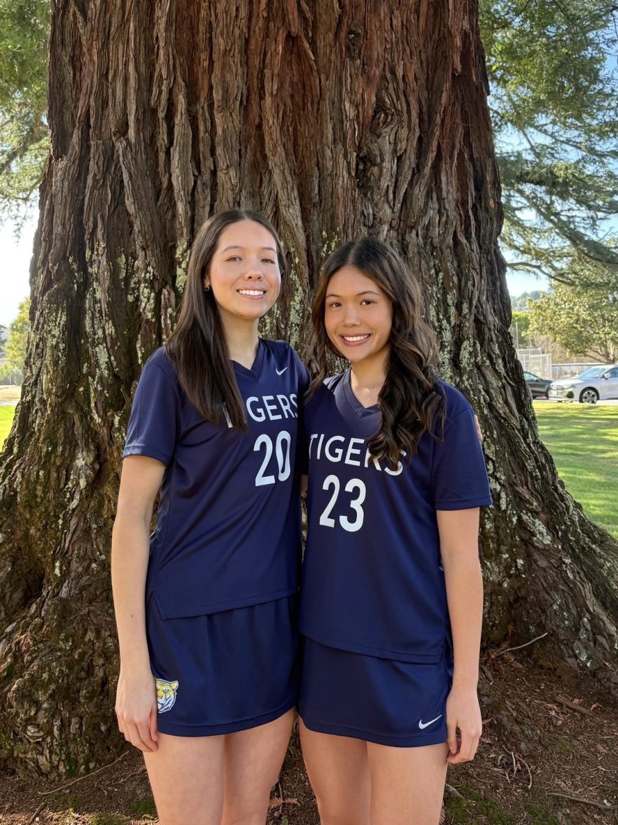 Reyna and Vanessa Gonzalez celebrate one last sports season together.